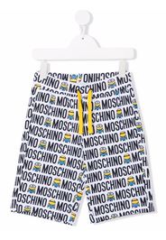 Moschino Kids Minions all-over logo print shorts - White