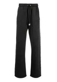 Off-White eyelet-detailed track pants - Black
