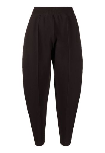 Pleats Please Issey Miyake tapered cropped knitted trousers - Brown