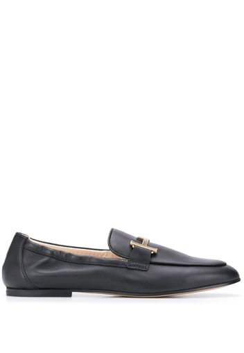 T logo loafers