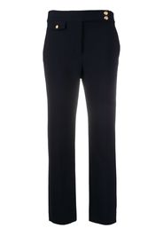 Renzo embossed button detail trousers
