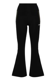 Versace logo-appliqué flared leggings - Black