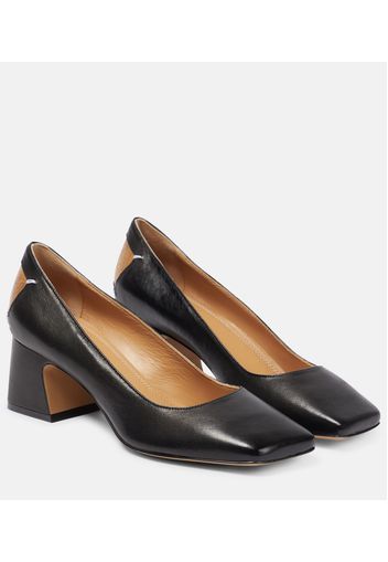 Four Stitch leather court pumps