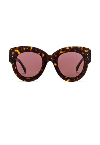 ALAÏA Round Cat Eye Sunglasses in Brown