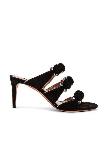 ALAÏA Pom Pom Studded Mules in Black