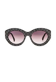 ALAÏA Almond Stud Sunglasses in Black