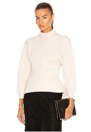 ALAÏA Fitted Sculpted Long Sleeve Sweater in Ivory