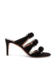 ALAÏA Pom Pom Studded Mules in Black