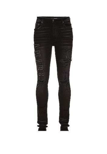 Amiri Logo Applique Jean in Black