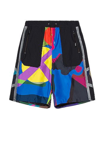 Sacai KAWS Print Shorts in Black,Pink