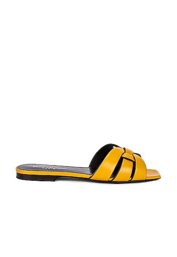 Saint Laurent Tribute Flat Sandals in Yellow