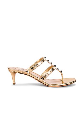 Valentino Garavani Rockstud Thong Sandals in Metallic Gold