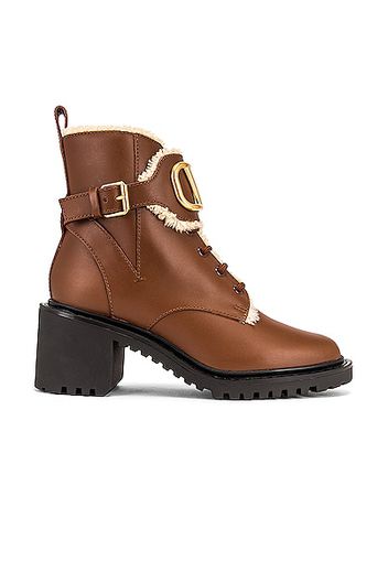 Valentino Garavani VLogo Signature Combat Boots in Brown