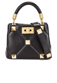 Valentino Garavani Mini Roman Stud Top Handle Bag in Black