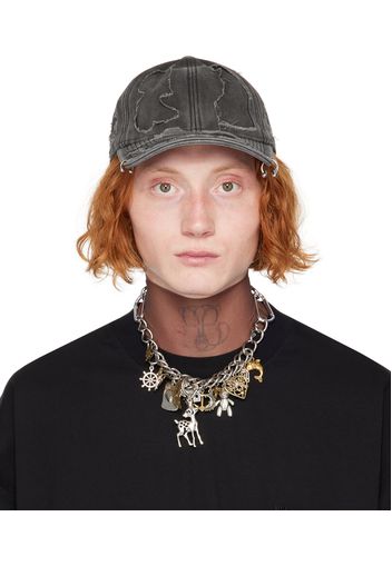 VETEMENTS Black Fully Distressed Piercing Cap