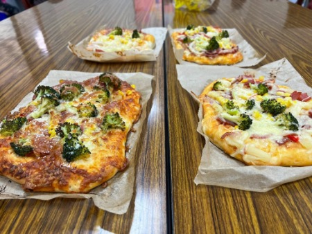 可能是披薩的圖像