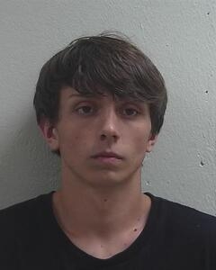 Mugshot of TRADER, GAGE E
