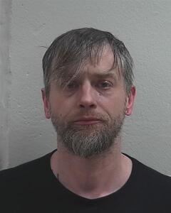 Mugshot of RHODES, JESSE A