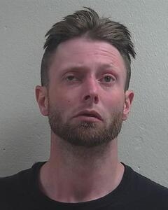 Mugshot of BENSON, MICHAEL L