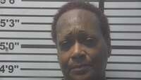 Mugshot of REID, PAMELA