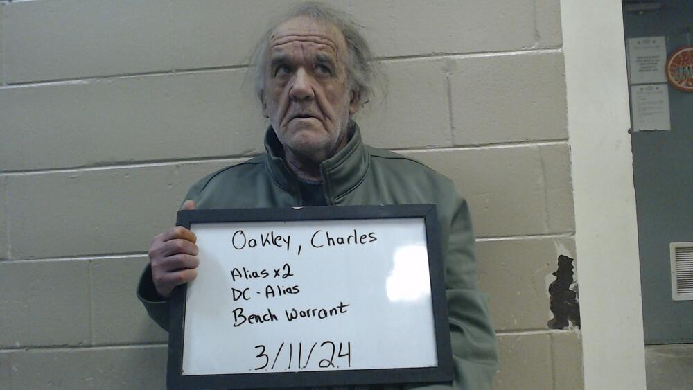 Mugshot of OAKLEY, CHARLES E