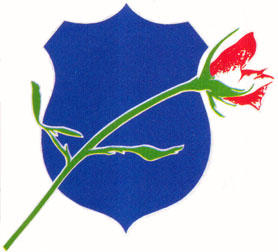 A solid police badge with a rose on top.