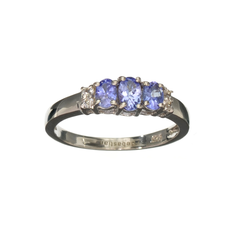 0.70CT Oval Cut Tanzanite And White Sapphire Sterling Silver Ring