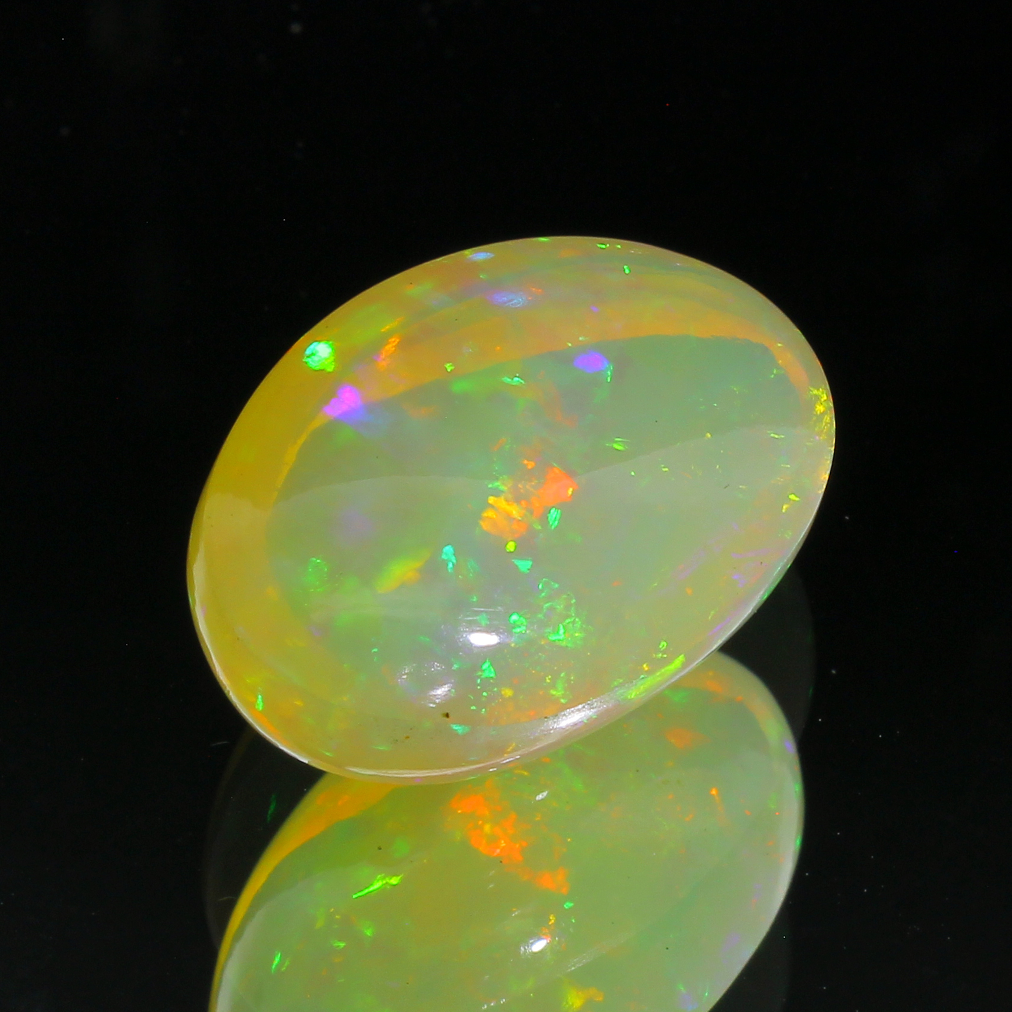 10.86CT Oval Cabochon White Opal Gemstone - Image 2