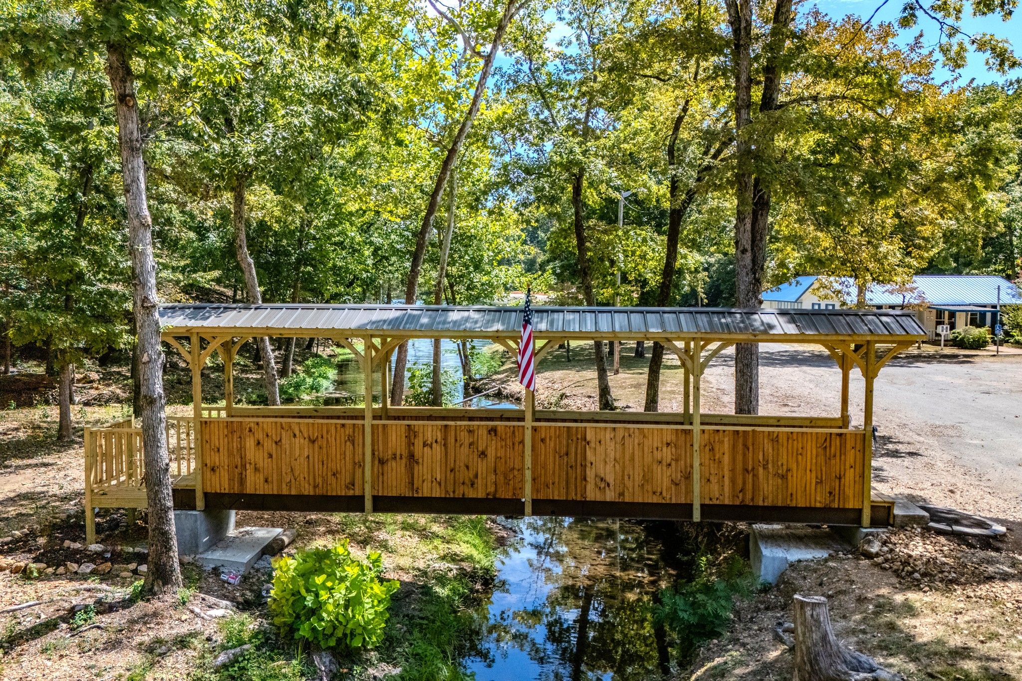Wooded Ozark Homesite with Two Community Lakes, Beach Access, and Spring River Recreation in Sharp County