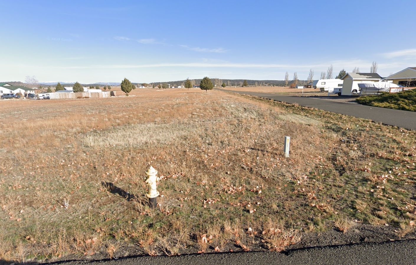 Great Road Frontage 0.14 Acre Lot near Nice Homes by Cal Pines Lodge and Donovan Reservoir in Modoc County California! Low Monthly Payments! - Image 5