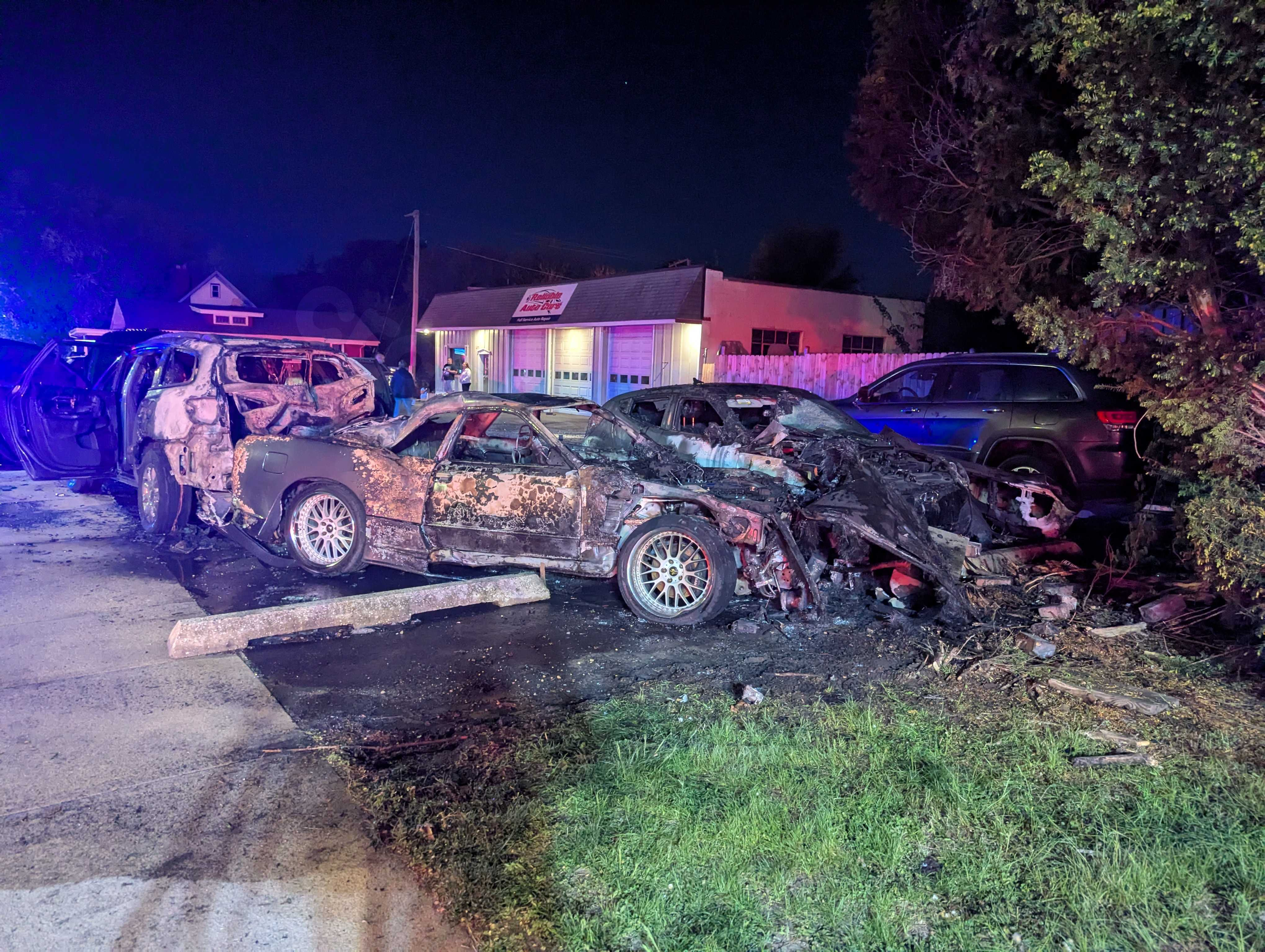 Fiery multi-car crash at North Main auto repair shop, nearby home damaged