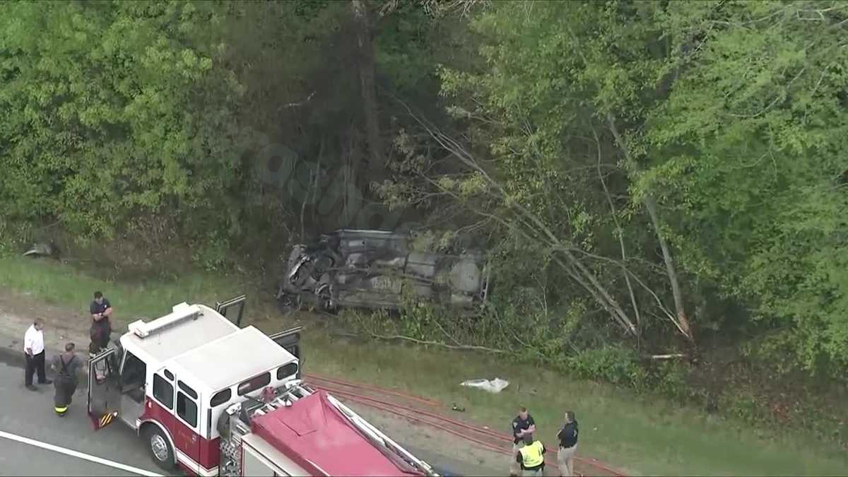 Serious crash on I-495 leaves vehicle on roof in woods