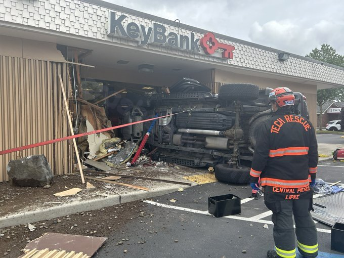 PHOTOS: Car crashes through front doors of Spanaway, WA bank
