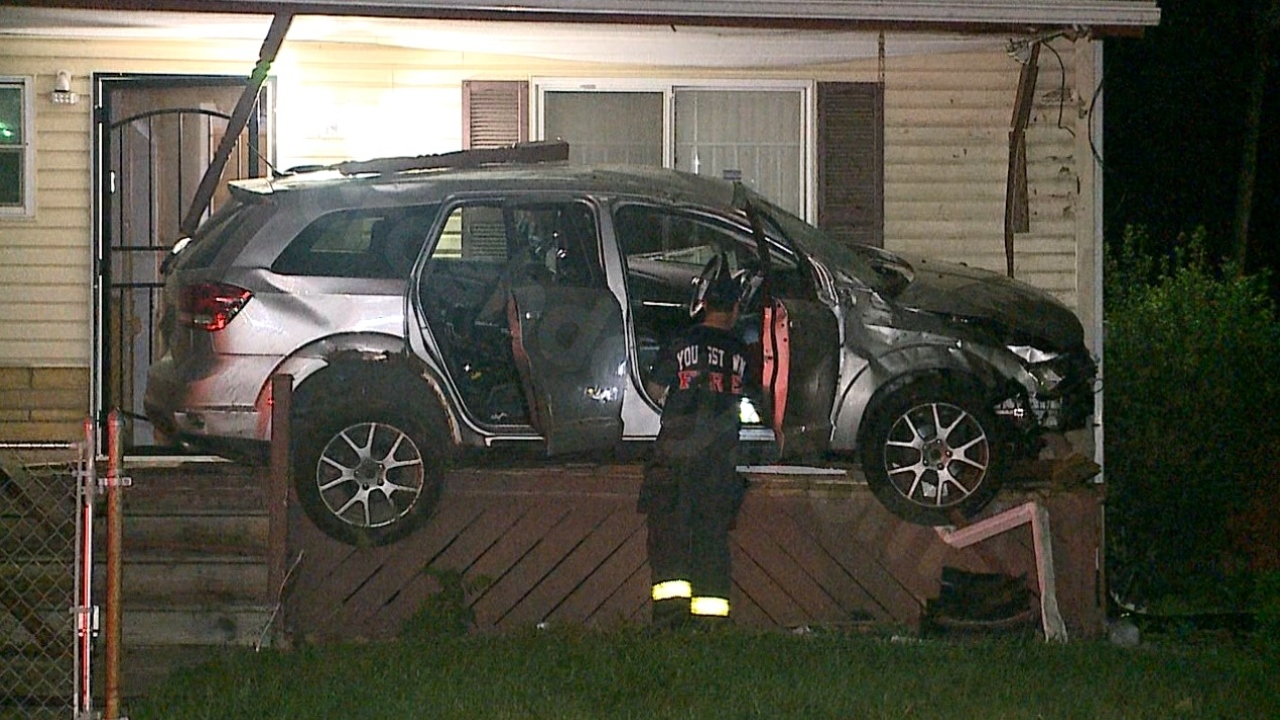 Car crashes into home, another into police cruiser