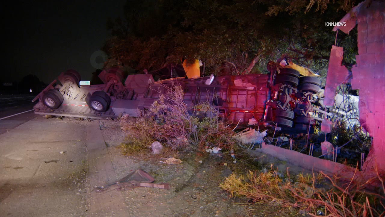Semi plows through sound wall on the Foothill Freeway