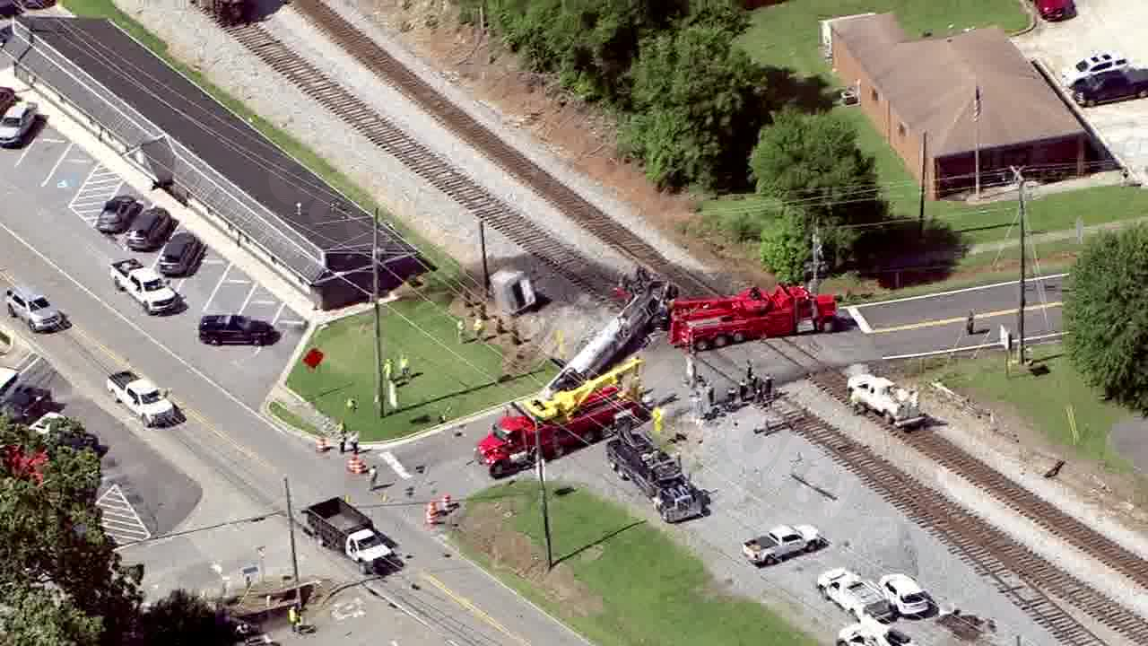 Train collision with asphalt truck causes minor spill in Emerson