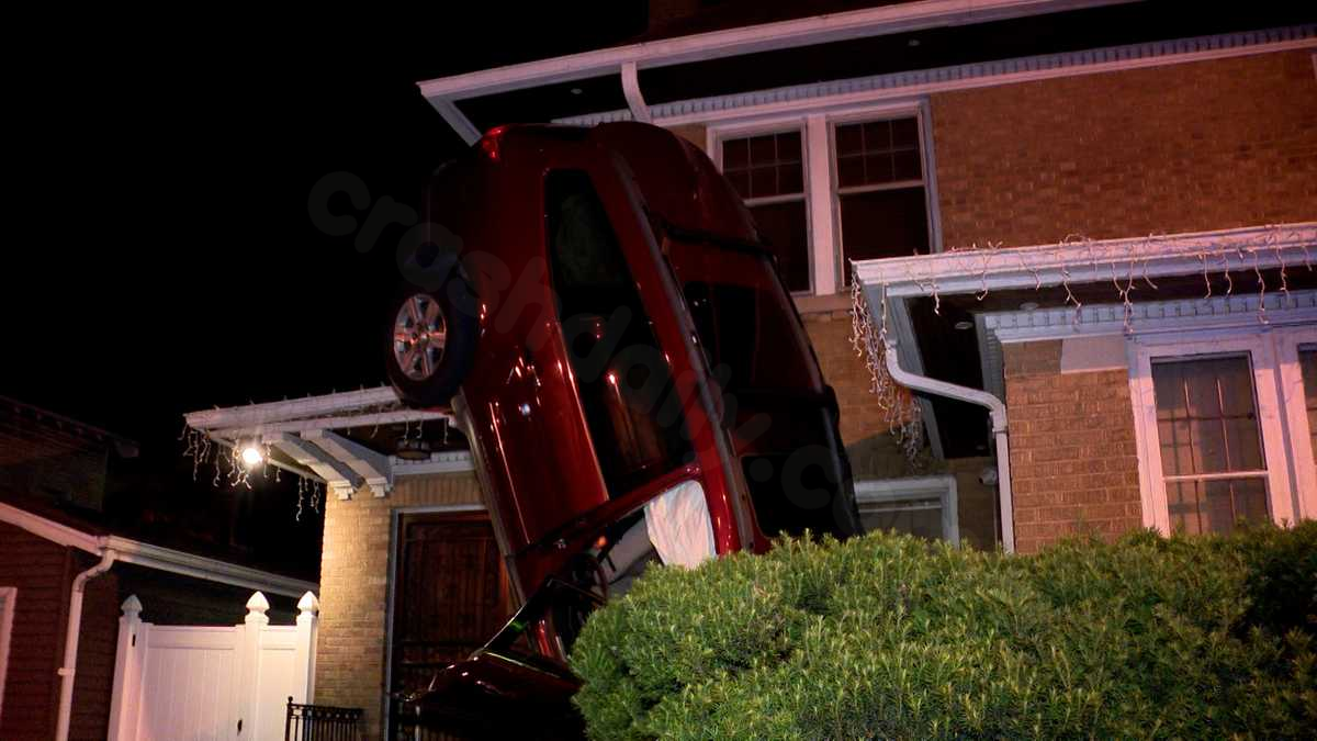 Car crashes into Milwaukee home in a vertical position