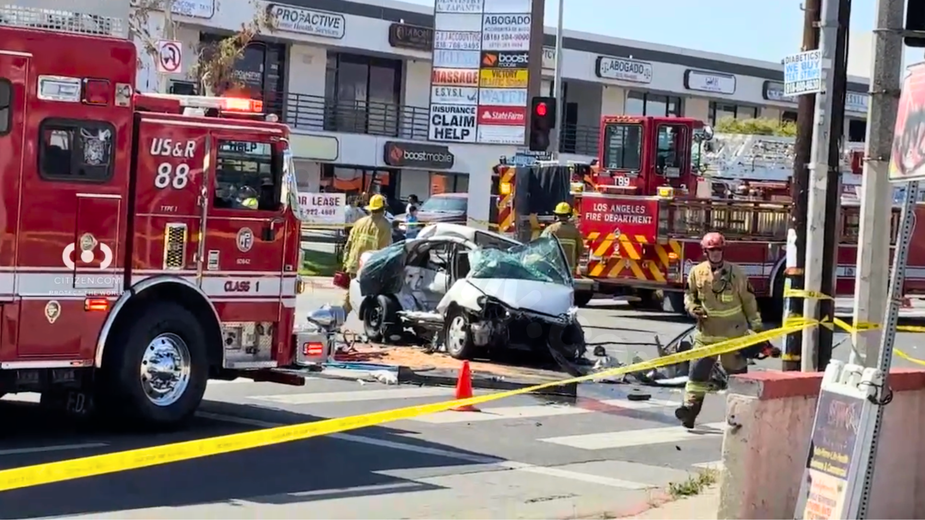 Sun Valley crash traps multiple victims in crushed vehicle.