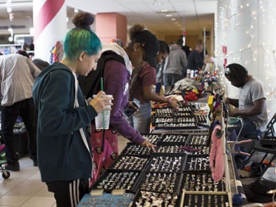 The campus community browsed through the various items for sale.
