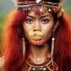 A beautiful woman from the Papua ethnicity with red hair and accessories such as a necklace or earrings-19564169
