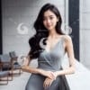 A beautiful young Asian woman wearing a grey dress-4700975