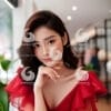 A beautiful young Asian woman wearing a red dress-11054123