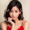 A beautiful young Asian woman wearing a red dress-30372