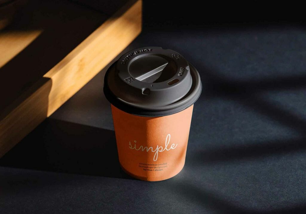 Coffee Cup on Black Background Mockup (psd)