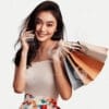 beautiful young Indonesian woman carrying lots of shopping bags with a cheerful expression-7430945412