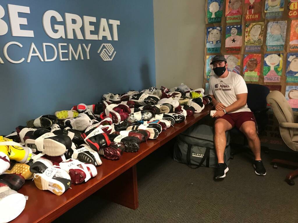 Spencer Eason-Riddle with Shoe Donations