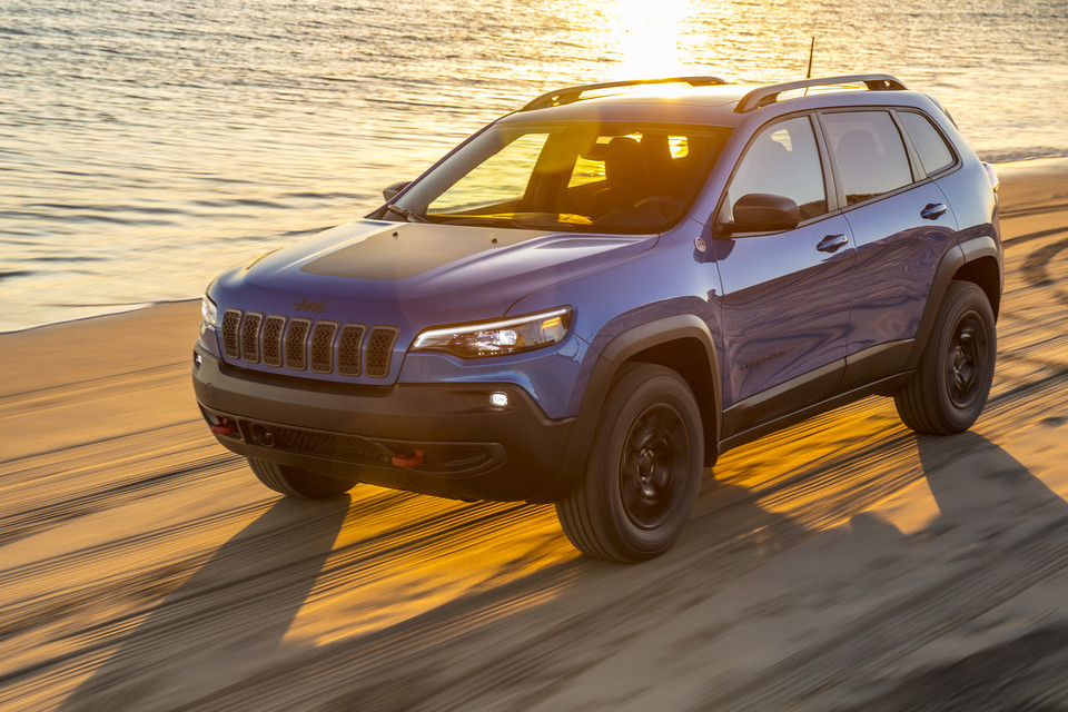 Sunset Blue Jeep Cherokee Trailhawk at the Beach 