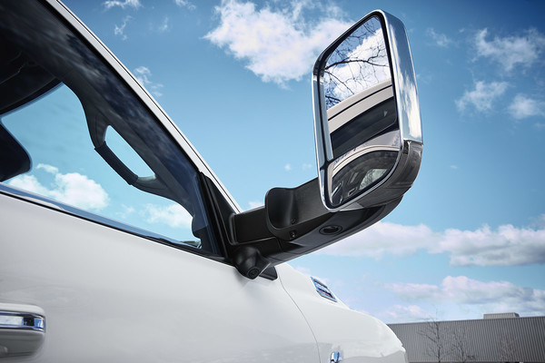 White Ram Exterior Tow Mirrors open on a Ram 2500