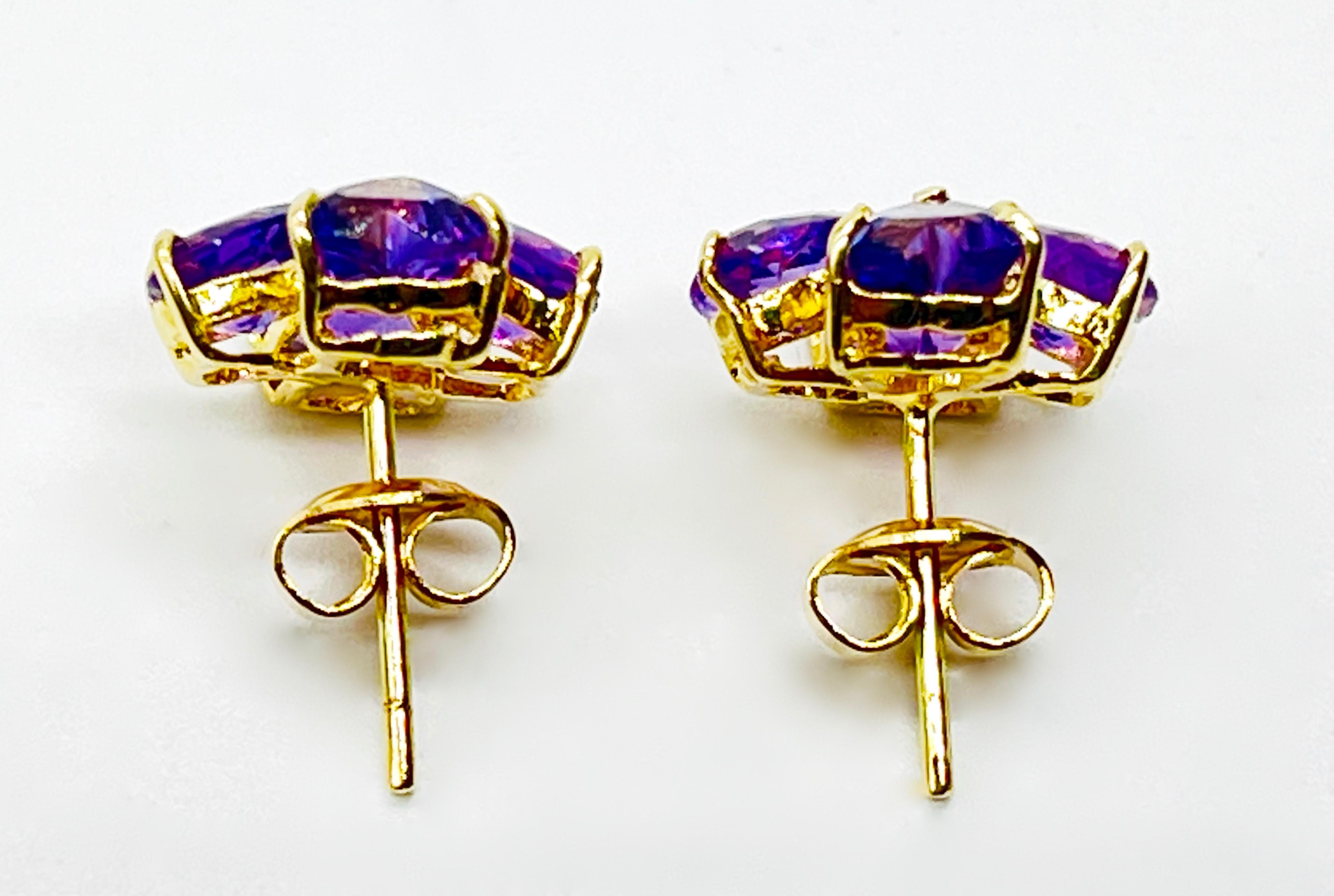 Złote kolczyki z ametystami