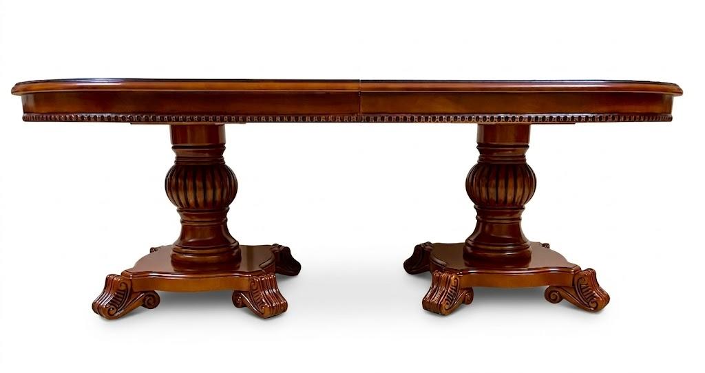 Pałacowy stół stojący na dwóch filarowych nogach